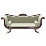 A REGENCY MAHOGANY & BRASS-INLAID SOFA, with shaped back, scroll arms, & upholstered pale green