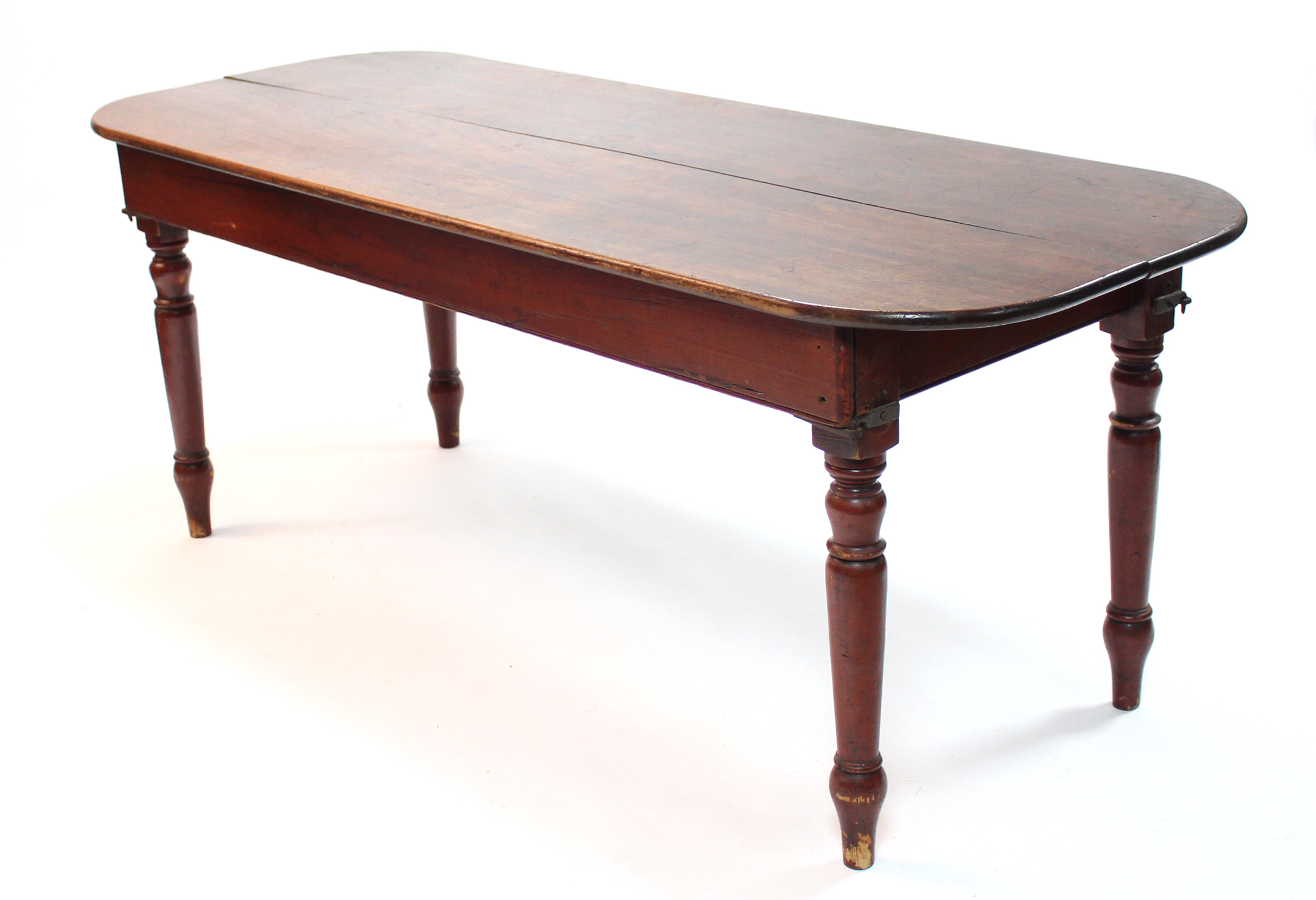 A Victorian mahogany rectangular portable serving table with rounded corners, on turned tapering