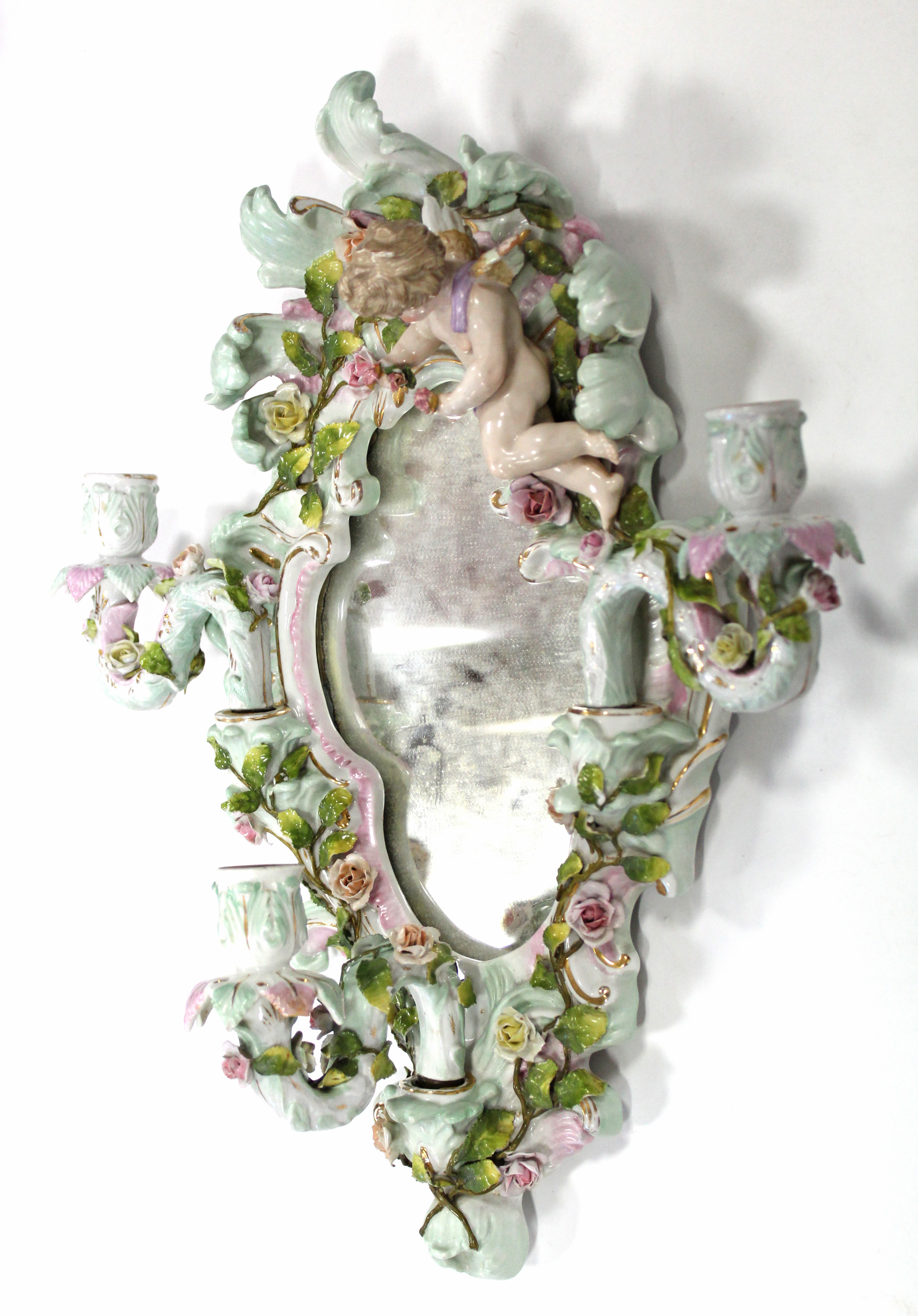 A 19th century Dresden porcelain shaped oval girandole with cherub surmount, all over floral - Image 3 of 6