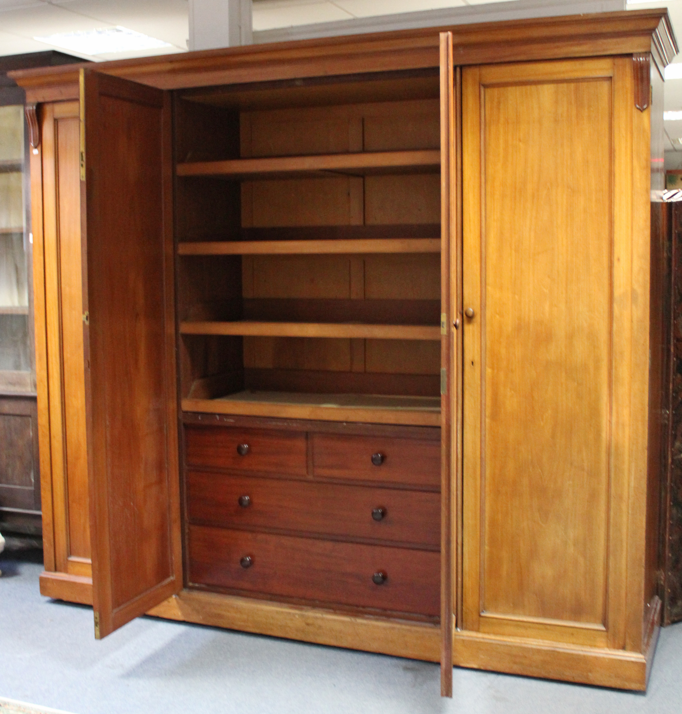 AN EARLY VICTORIAN MAHOGANY WARDROBE, the centre fitted four sliding trays above two short & two - Image 2 of 4