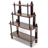 A Victorian rosewood étagère of four graduated rectangular open tiers, on bobbin-turned supports,