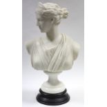 A late 19th century white marble classical female bust, on turned socle; 17” high.