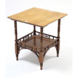 A late Victorian mahogany square two-tier occasional table on ring-turned legs, 20½” wide x 23½”