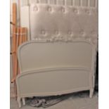 A continental-style white painted wooden 5’ 6” bedstead, complete with mattress.