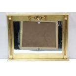 A reproduction gilt frame overmantel mirror, 40½” wide x 29¼” high; & a large rectangular wall