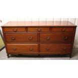 Another oriental-style rosewood-finish sideboard fitted three frieze drawers above two ranks of