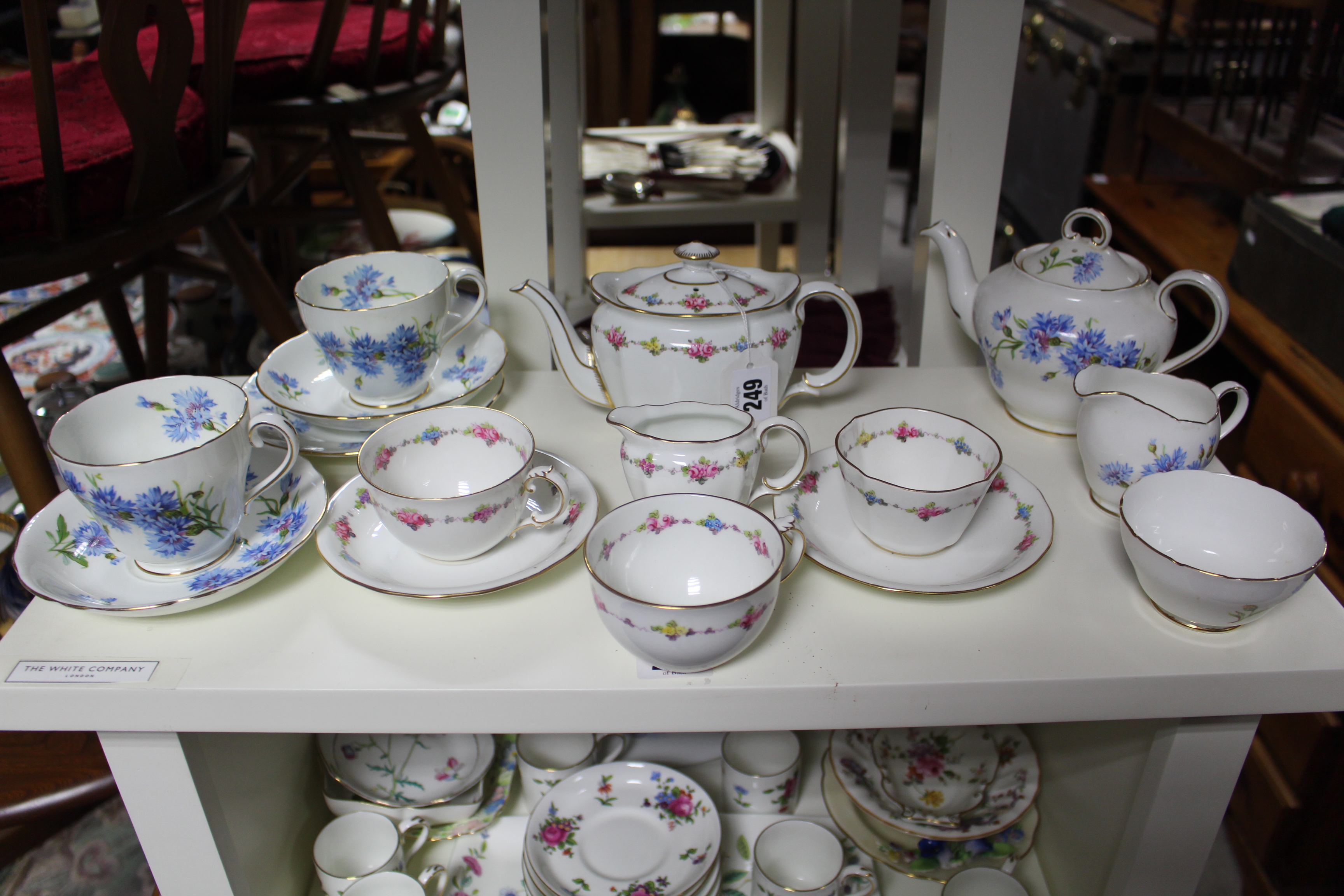 A Royal Crown Derby floral decorated seven piece tea service for two; a set of five Limoges