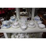 A Royal Crown Derby floral decorated seven piece tea service for two; a set of five Limoges