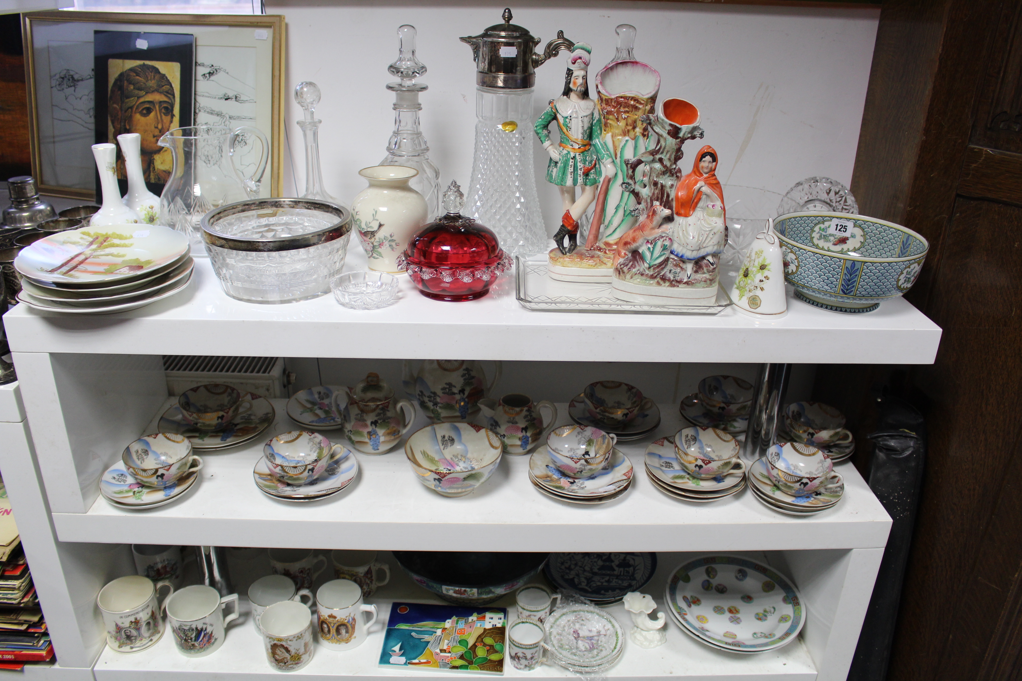 Two Victorian Staffordshire pottery spill vases; a Royal Doulton floral decorated bowl; a similar