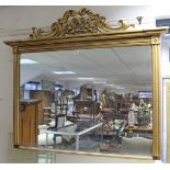 A 19th century rectangular overmantel mirror in giltwood frame & with scroll surmount, 46” wide x