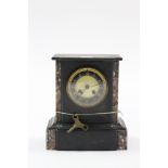 A Victorian mantel clock with striking movement, & in black slate & marble case, 9¾” high.