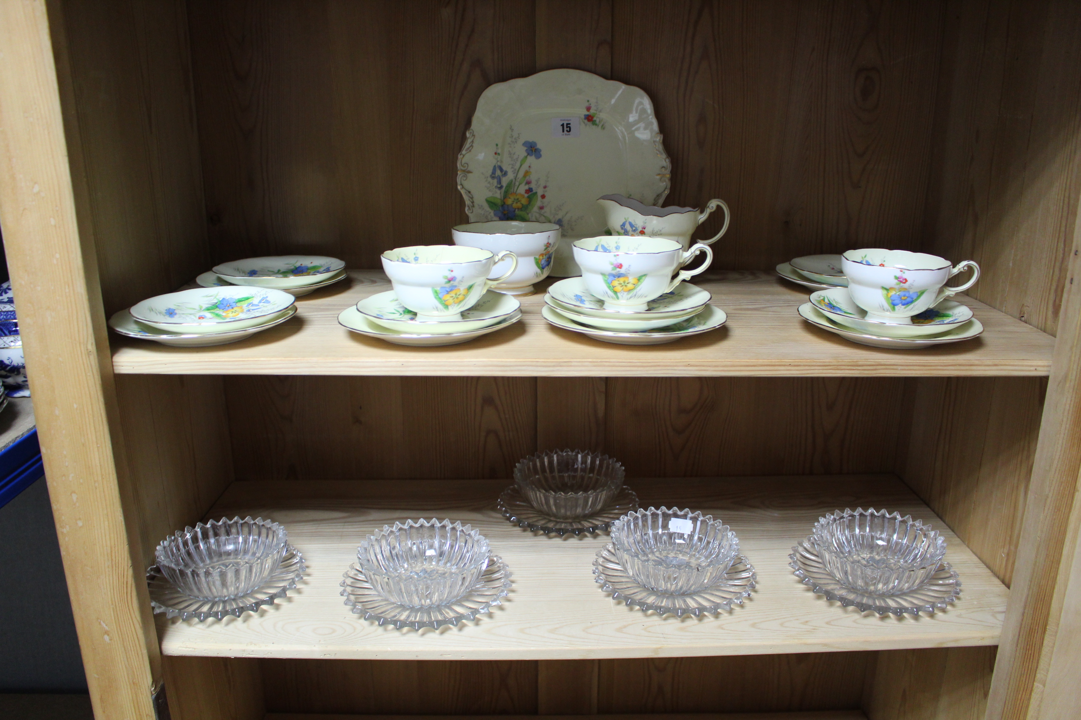 A Paragon bone china “Primrose” pattern nineteen piece part tea service; four table lamps; &