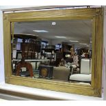 A large gilt frame rectangular wall mirror with fluted border, & inset bevelled plate, 31” x 43½”.