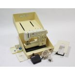 A Frister & Rossman “902” electric sewing machine, w.o., with case.