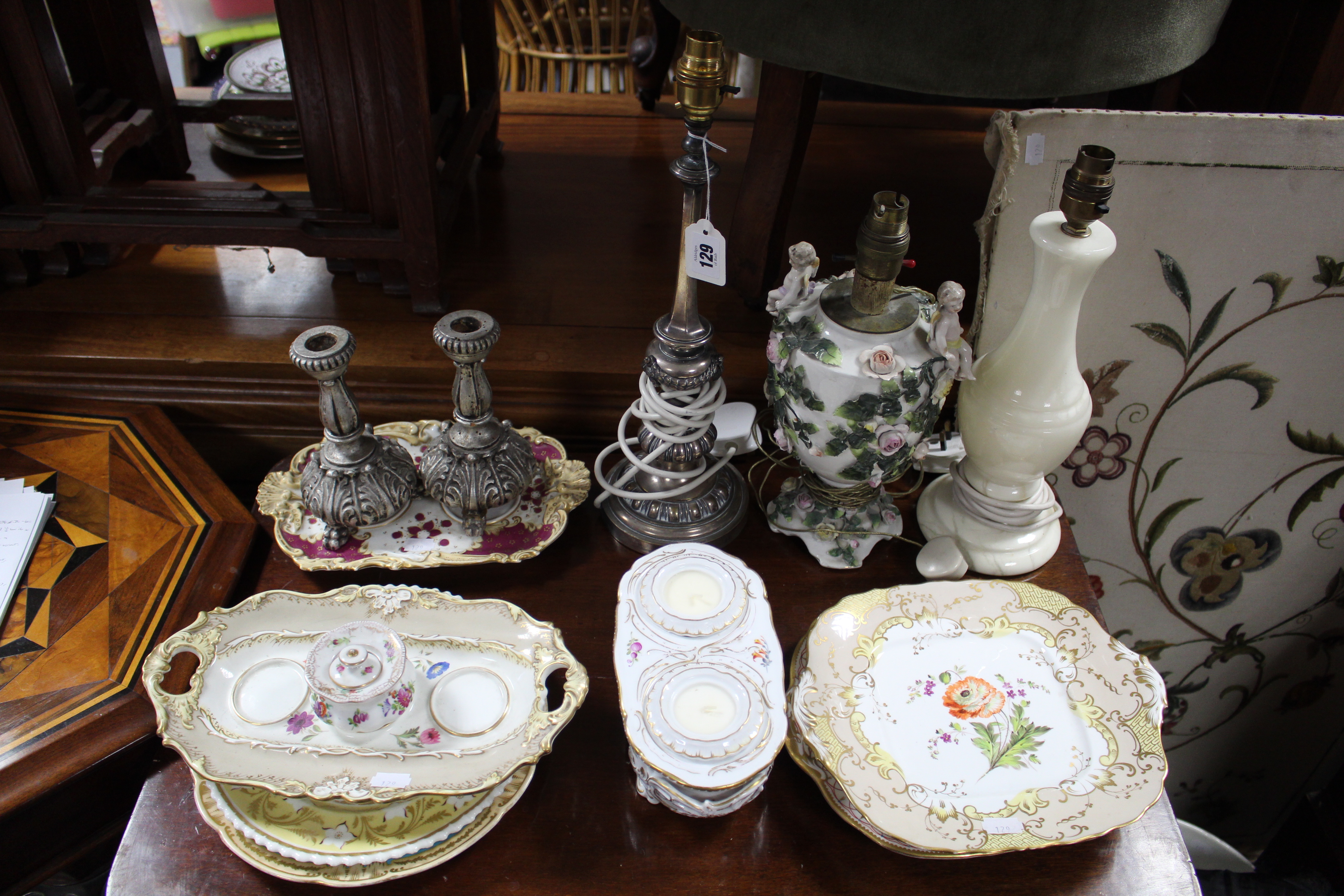 A silver plated table lamp; together with two other table lamps; four various Victorian decorative