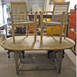 A teak garden table with rounded ends to the rectangular top, & on square legs with plain