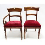 A 19th century mahogany bow-back dining chair with open scroll arms, padded seat, & on turned &