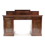 A Victorian mahogany sideboard, the rectangular top with stage-back, fitted three frieze drawers