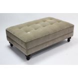 A large rectangular stool upholstered buttoned mushroom velour, & on short turned legs, 50” x 31”.