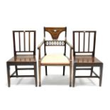 An Edwardian inlaid mahogany elbow chair with padded seat, & on square tapered legs; together with a