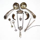A silver-plated chatelaine; a pair of silver-plated ladles; two horn brooches, etc.