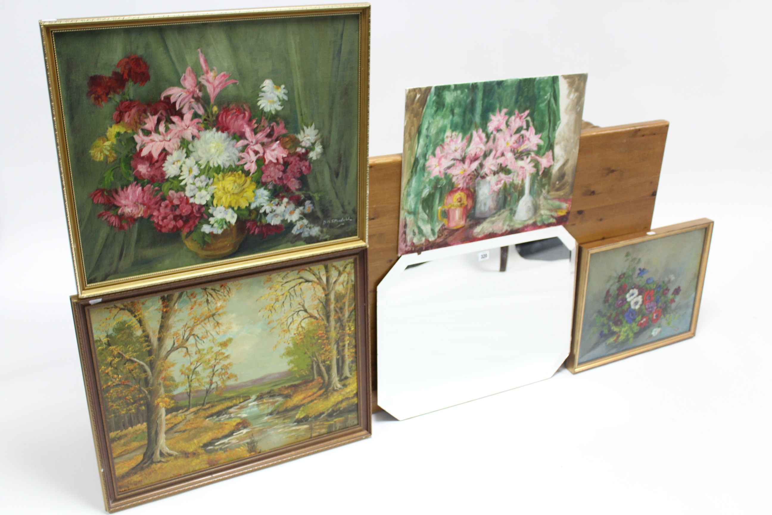 A frameless rectangular bevelled wall mirror, 24” x 18”; together with four oil paintings.