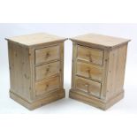A pair of pine three drawer bedside chests, each on plinth base, 21½” wide x 29½” high.
