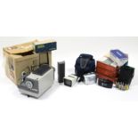 An Olympus “V II” Zoom 80 camera; various camera accessories; a Panasonic “NV-G517” mini digital