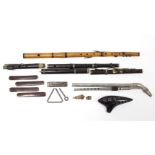 A treen flute, 23½” long; various other wind instruments, etc.
