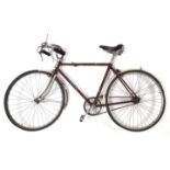 A mid-20th century B.S.A. gents bicycle (crimson) w.a.f.