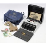A Silver-Reed “SR100 Tabulator” portable typewriter; various wood-working tools; various golf balls,