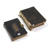 Two antique leather-bound bibles, both w.a.f.