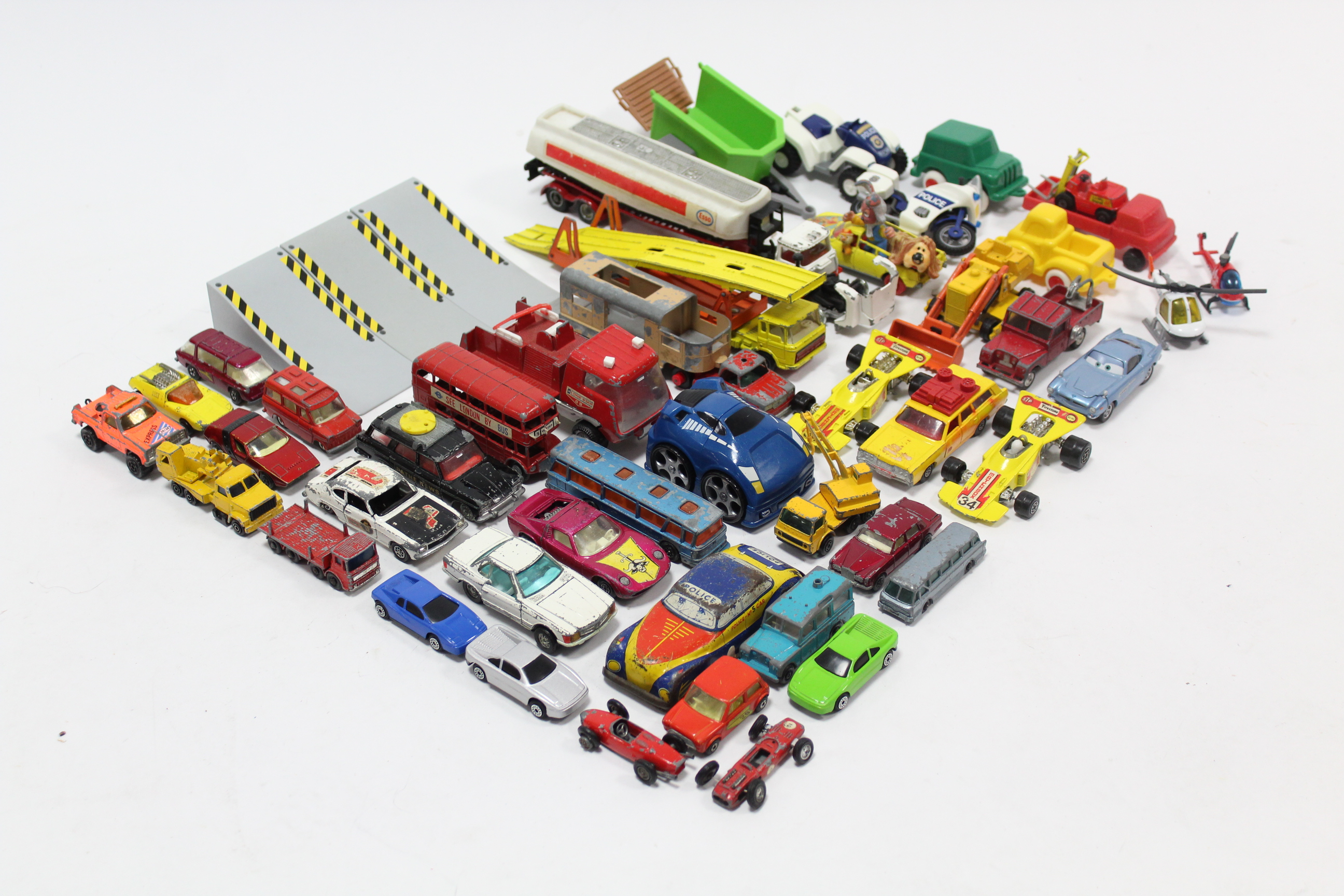 Approximately thirty various scale model vehicles by Corgi, Lone Star, & others, all unboxed.