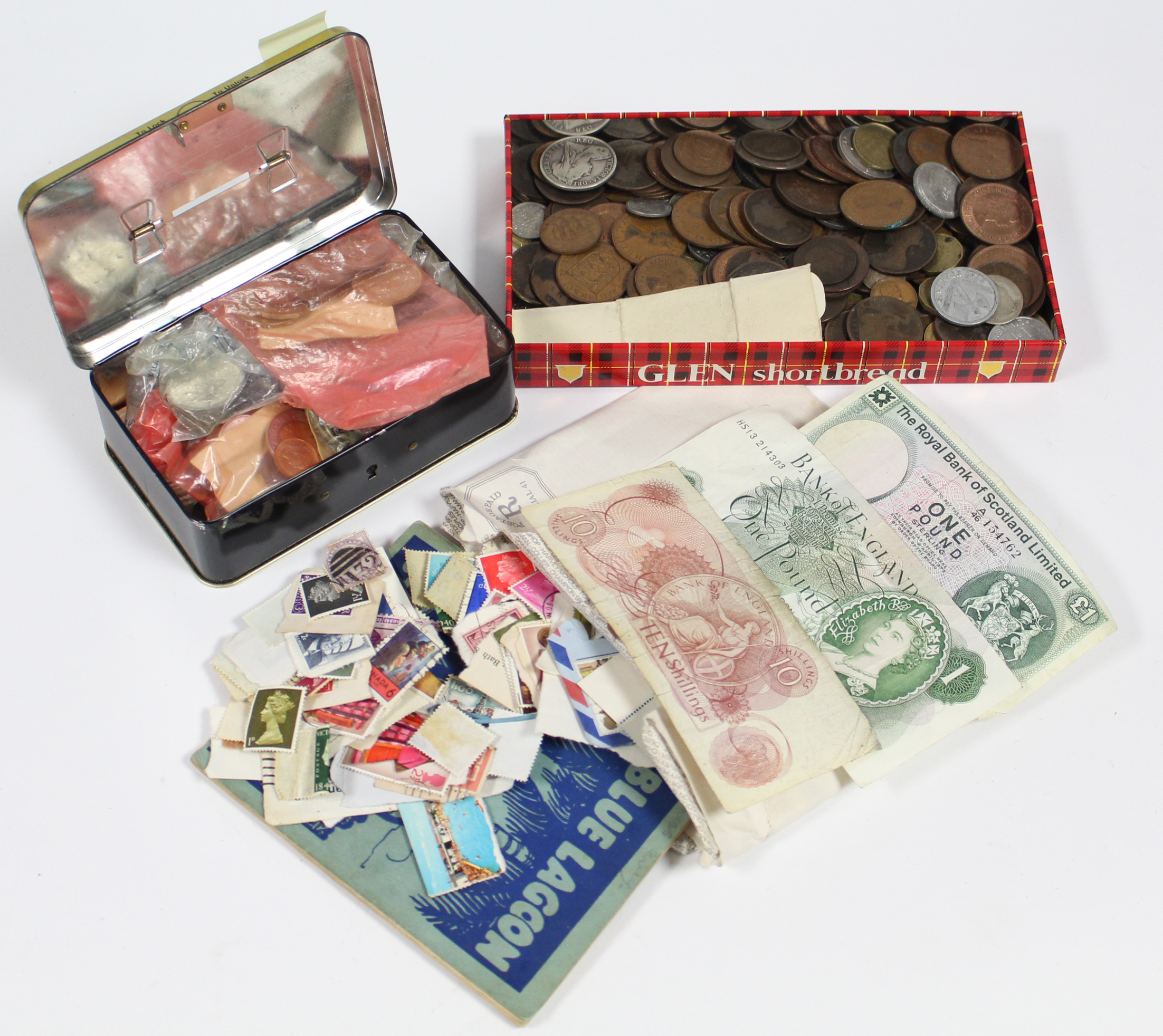 A quantity of British coin s & banknotes; a quantity of foreign coins; & a small quantity of loose