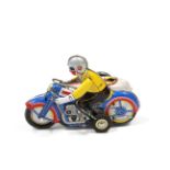 A Chinese clockwork operated lithographed tinplate toy motorcycle & sidecar, unboxed.