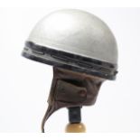 A mid-20th century motor cyclist’s safety helmet.