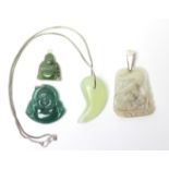 Four modern jade pendants.