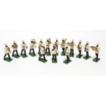 A part set of fifteen painted lead figures Trinidad & Tobago marching bandsmen, unboxed.