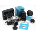 A Praktica LTL 50mm camera; a Photex Paragon lens; a Pentax “Automatic 2X Tele converter.