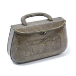 A Huntley & Palmers novelty biscuit tin in the form of a handbag, 8”wide.