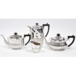 An E.P.N.S. three-piece tea & coffee service of oval semi-fluted design; & a similar oblong teapot.