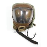 A mid-20th century fireman’s breathing apparatus helmet.