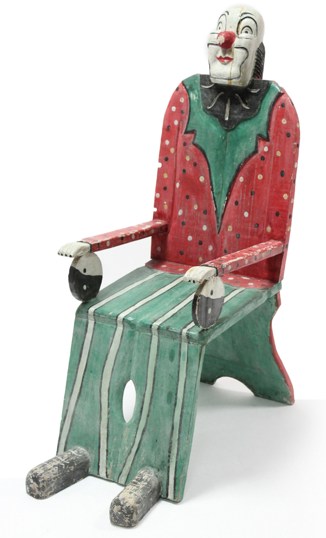 AN EARLY/MID 20th CENTURY PAINTED WOODEN NOVELTY CIRCUS/FAIRGROUND “CLOWN” CHAIR, 42½” HIGH.