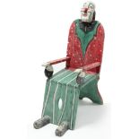 AN EARLY/MID 20th CENTURY PAINTED WOODEN NOVELTY CIRCUS/FAIRGROUND “CLOWN” CHAIR, 42½” HIGH.
