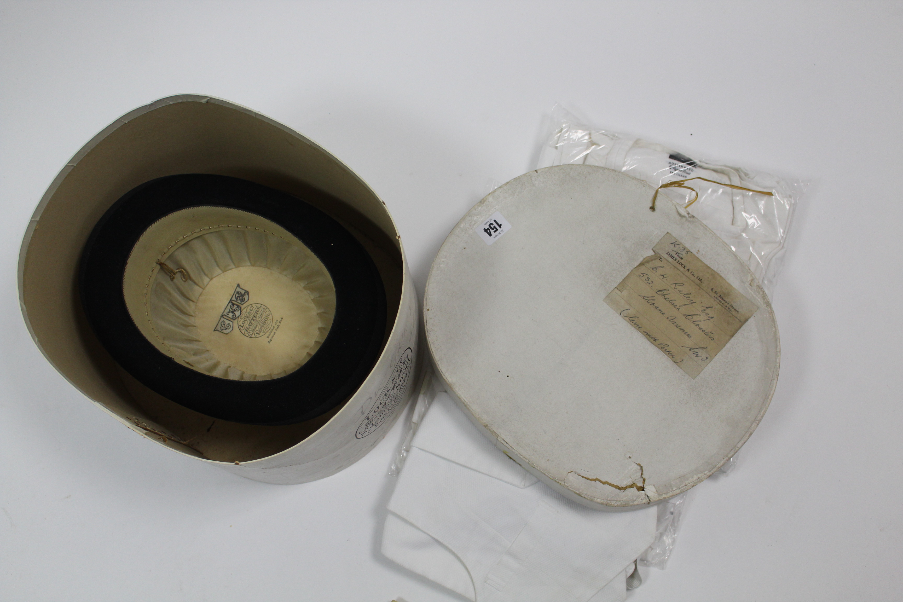 A Lock & Co. London black felt bowler hat with cardboard hatbox; a pair of kid leather gloves; two - Image 4 of 7