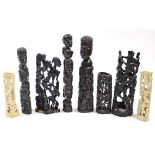 Two African carved bone figural ornaments, 11”, & 10½” high; & six various African carved hardwood