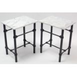 A pair of black-finish wrought-metal bedside tables, each with rectangular white marble top, 18”