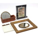 A gilt frame circular wall mirror, 13¼” diameter; an oval wall mirror; a gilt picture frame; a