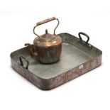 A 19th century copper rectangular two-handled baking tray, 22” x 17¾”; & a copper circular kettle,