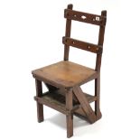 A late 19th/early 20th century oak metamorphic folding library step/chair.